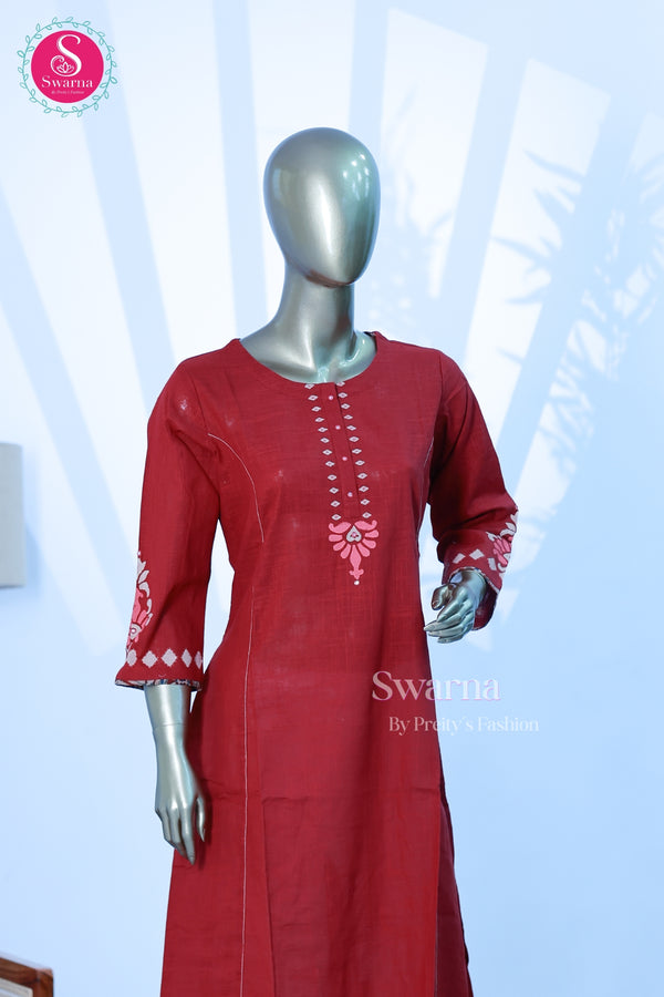 A graceful cotton top in a rich maroon shade with elegant printed detailing - SWRM069